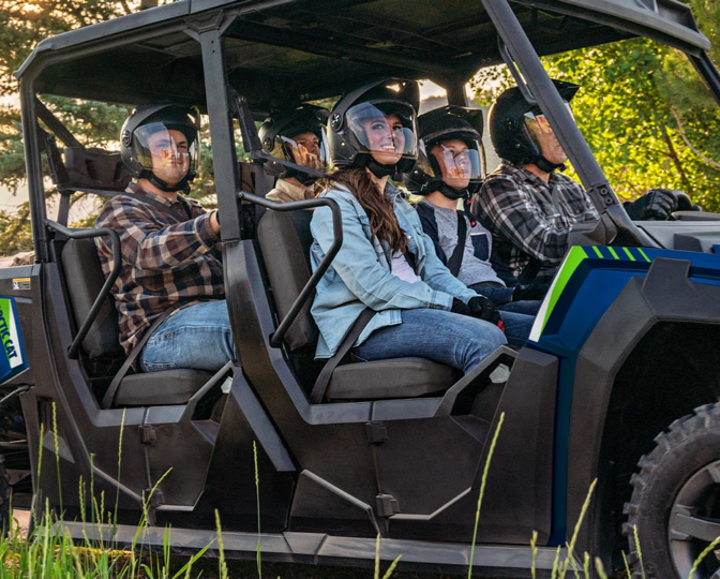 Family seated in a Bryce ATV rental vehicle
